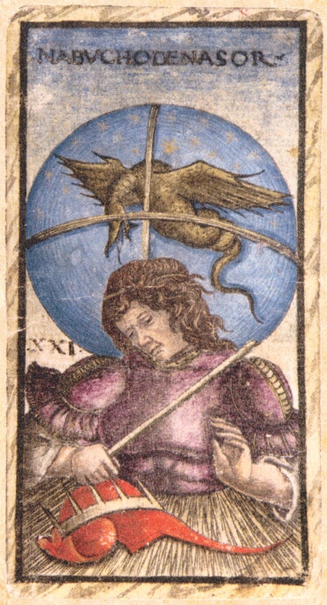 Atout XXI du tarot Sola Busca, Nabuchodonosor, un personnage allongé sous un globe céleste surmonté d'un aigle